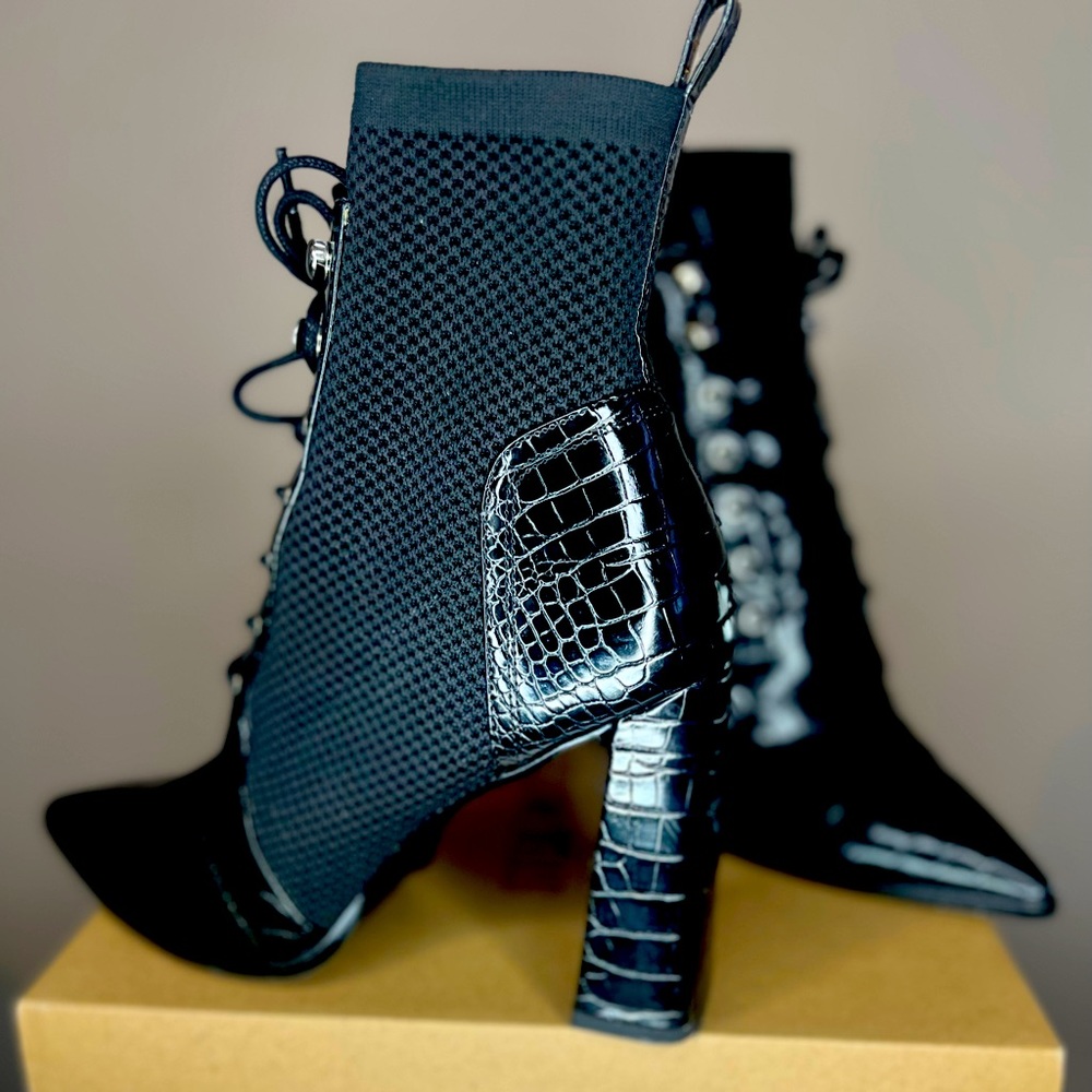 Black Steve Madden Booties.
